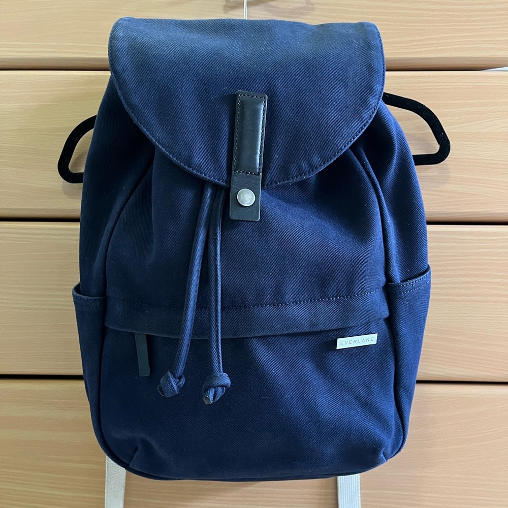 Everlane navy blue single strap backpack